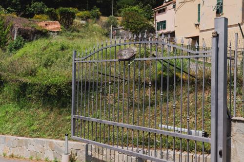 a metal fence with a object on top of it at La Quiete in Genova
