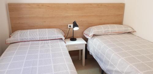 Cama o camas de una habitación en Apartamento Sand Beach