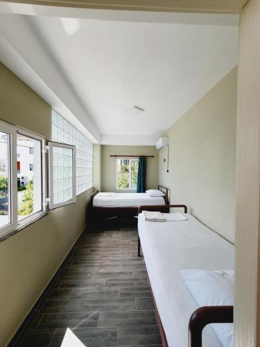 Katil atau katil-katil dalam bilik di Klerichi Hotel