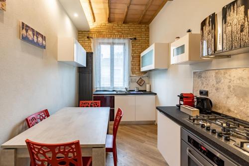 Kuchyňa alebo kuchynka v ubytovaní Elegante Casa Mafalda con vista