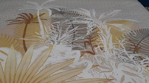a painting of palm trees on a wall at HAPPY HoMe For You in Lunel