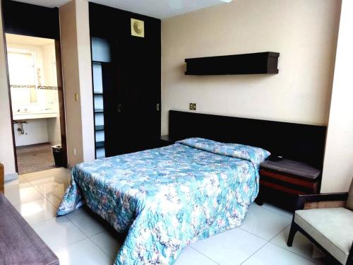 Cama o camas de una habitación en Hotel Mary Celaya