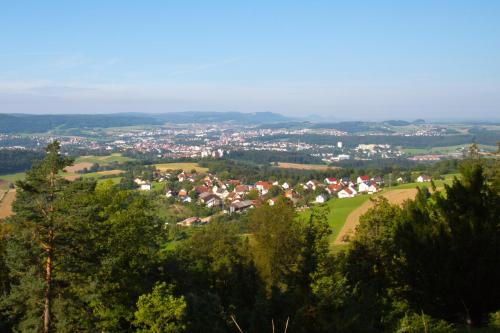 a view of a small town in the hills at Apartmenthaus Renz in Aalen