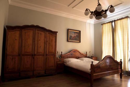 Posteľ alebo postele v izbe v ubytovaní apartmány Antik Pratterov Dom