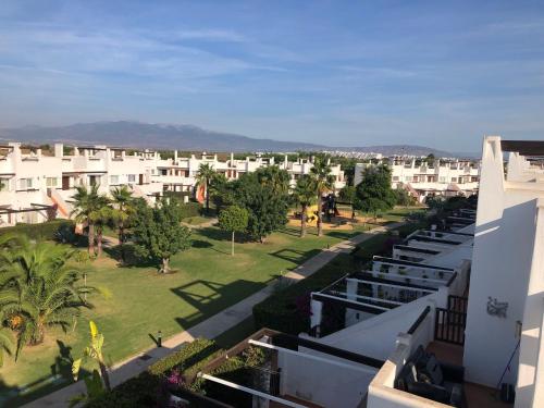 an aerial view of a city with buildings and trees at "La Piña" Condado Golfresort 1574 in Alhama de Murcia