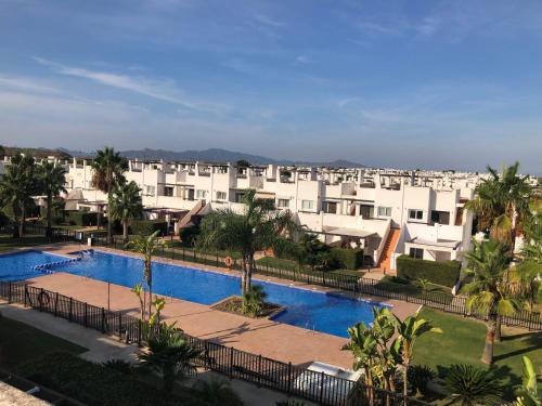 an aerial view of a resort with a swimming pool at "La Piña" Condado Golfresort 1574 in Alhama de Murcia