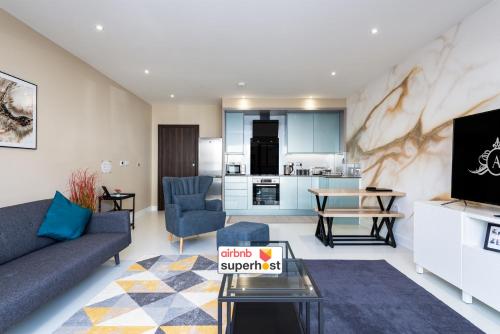a living room with a couch and a table at For Work Trips - Quiet & Ready to Go - Apartment 1 in Gillingham