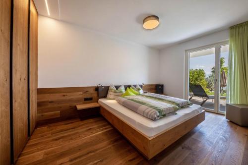 Llit o llits en una habitació de Pataunerhof Tilia Lodge