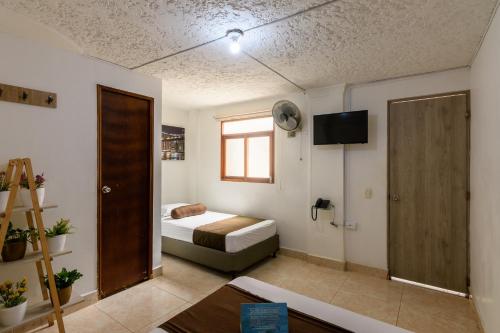 Postel nebo postele na pokoji v ubytování Hotel Sol del Estadio
