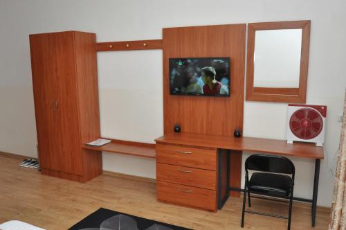 Μια τηλεόραση ή/και κέντρο ψυχαγωγίας στο Hôtel Sky blue Mada