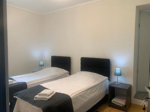 Un ou plusieurs lits dans un hébergement de l'établissement Hotel Lemi