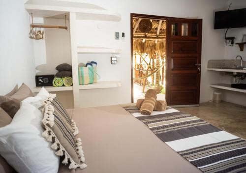 Ένα ή περισσότερα κρεβάτια σε δωμάτιο στο Villa Los Mangles Boutique Hotel