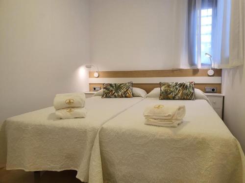 Apartamento con parking con piscina junto a la playa