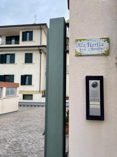 Сертификат, награда, вывеска или другой документ, выставленный в B&B Villa Fiorita