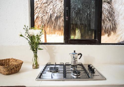Η κουζίνα ή μικρή κουζίνα στο Villa Los Mangles Boutique Hotel