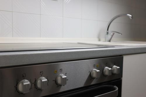 Kuchyň nebo kuchyňský kout v ubytování Holiday Apartment Siviri