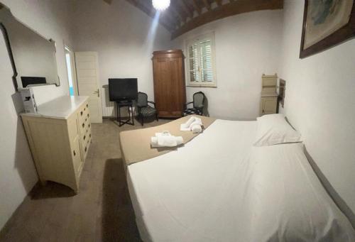 Katil atau katil-katil dalam bilik di Agriturismo Baratti