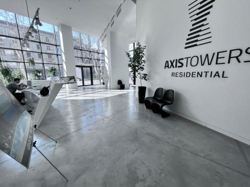a room with a wall with a sign on it at Apartment in AXIS TOWERS, Tbilisi business center in Tbilisi City