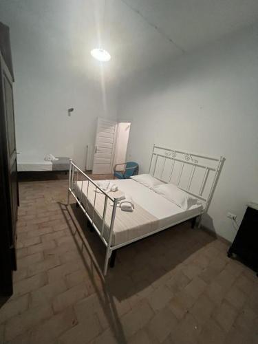 Katil atau katil-katil dalam bilik di Agriturismo Baratti