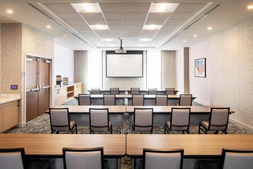 a conference room with a large table and chairs at Hyatt Place Scottsdale North in Scottsdale
