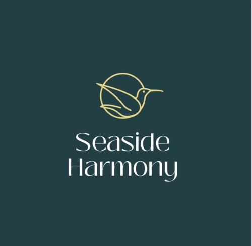 a logo for a seafood restaurant with the words garlic harmony at Seaside Harmony in Pogorzelica