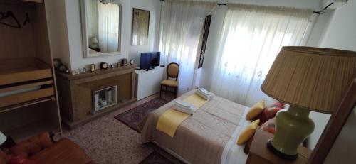 Ένα ή περισσότερα κρεβάτια σε δωμάτιο στο La Badia del Cavaliere 2