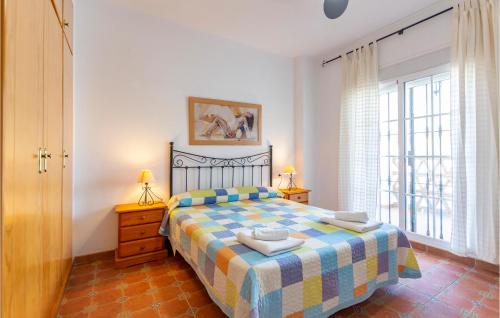 Llit o llits en una habitació de Cozy Apartment In Alcaucn With Wifi
