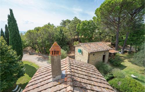 a building on top of a roof with a tower at 2 Bedroom Lovely Home In Loro Ciuffenna in Loro Ciuffenna