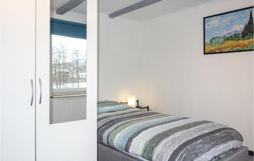 Ein Bett oder Betten in einem Zimmer der Unterkunft Amazing Home In Medebach With Kitchen
