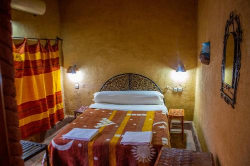 Кровать или кровати в номере Riad Du Sud