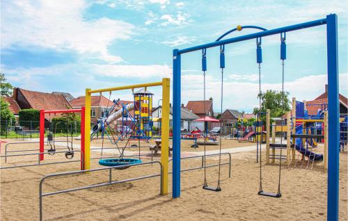 a playground with many different types of playground equipment at Stunning Home In Sint-Annaland in Sint Annaland