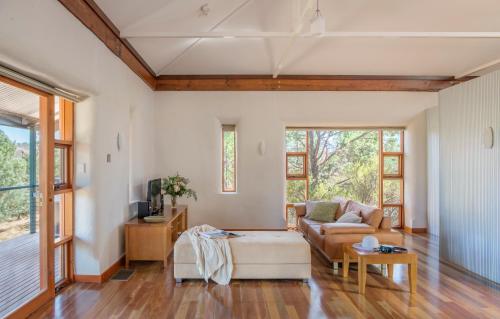 
a living room filled with furniture and a window at Rawnsley Park Station in Flinders Ranges
