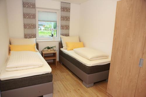 Postel nebo postele na pokoji v ubytování Appartements Dullnig