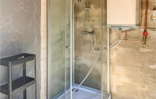 a shower with a glass door in a bathroom at Amazing Home In Torsby With Wifi in Torsby