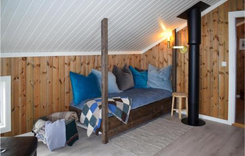 A bed or beds in a room at Awesome Home In Eggedal With 4 Bedrooms