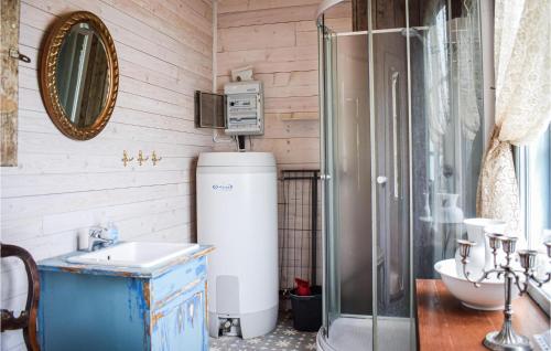 a bathroom with a toilet and a sink and a shower at 2 Bedroom Gorgeous Home In Bottnaryd in Bottnaryd