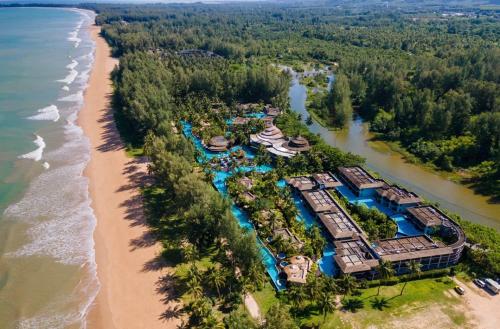 an aerial view of the resort and the beach at The Haven Khao Lak in Khao Lak