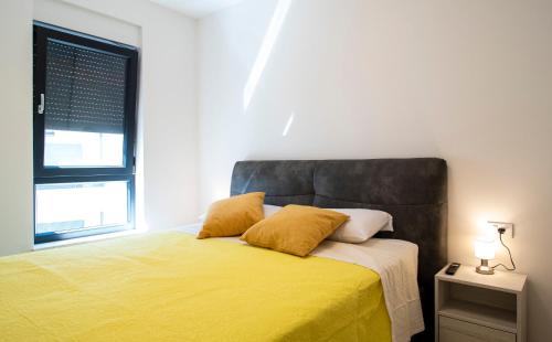 Postel nebo postele na pokoji v ubytování Lijon