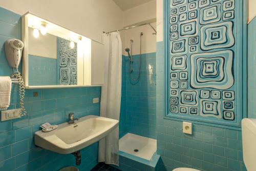 Koupelna v ubytování Albergo Belvedere