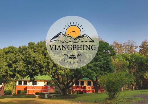 a sign that says vanguing in a park at ViangPhing Resort in Mae Chan