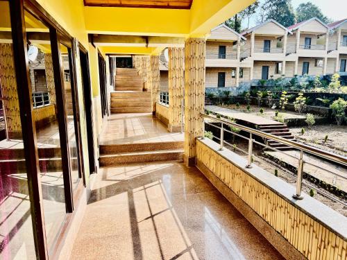 a view of a balcony of a building at NEELGAGAN RESORT in Chaukori