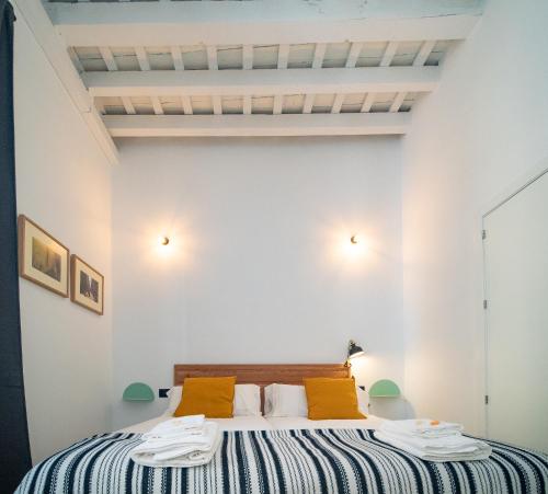 En eller flere senge i et værelse på Casa Miguel - Apartamento 2