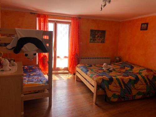 Ένα ή περισσότερα κρεβάτια σε δωμάτιο στο Casa Miki
