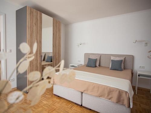 Кровать или кровати в номере Ferienhaus Kaimt Zell