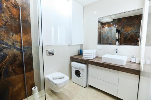 Kúpeľňa v ubytovaní M&K Apartamenty Rodzinny, Gdańsk - Wyspa Sobieszewska
