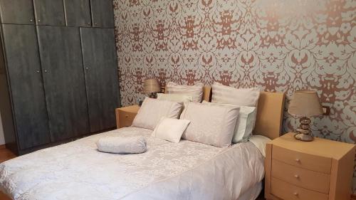 Кровать или кровати в номере Villa Omega Kefalonia