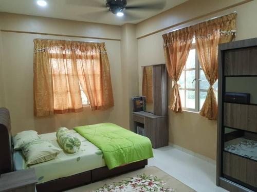 Katil atau katil-katil dalam bilik di BerataStay @ Segamat