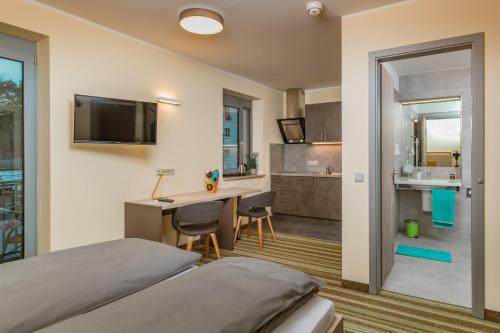 Televisyen dan/atau pusat hiburan di ELLY Hostel
