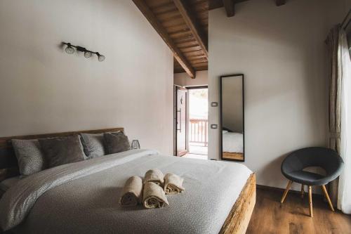 Krevet ili kreveti u jedinici u objektu Coste del Gaggio - Country House B&B - Garda Trentino