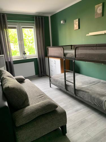 Posteľ alebo postele v izbe v ubytovaní Marias Apartment